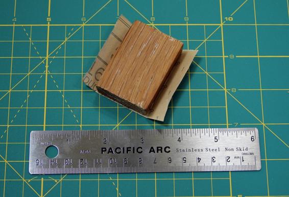 Use a sanding block to sand flat surfaces.