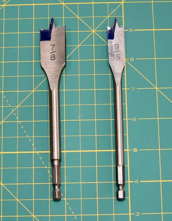 Use paddle bits to drill the larger holes. These are two of the three Irwin Speedbor Blue-Groove bits mentioned in the text.