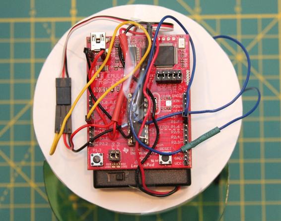 Tape the loose wires to the microcontroller.