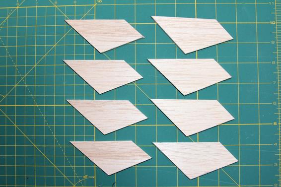 Cut four fins for each stage from 3/32” balsa. Sand until smooth, and round all edges except the root edge of the fins.