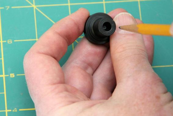 Use a pencil to smooth out any imperfections in the nozzle.