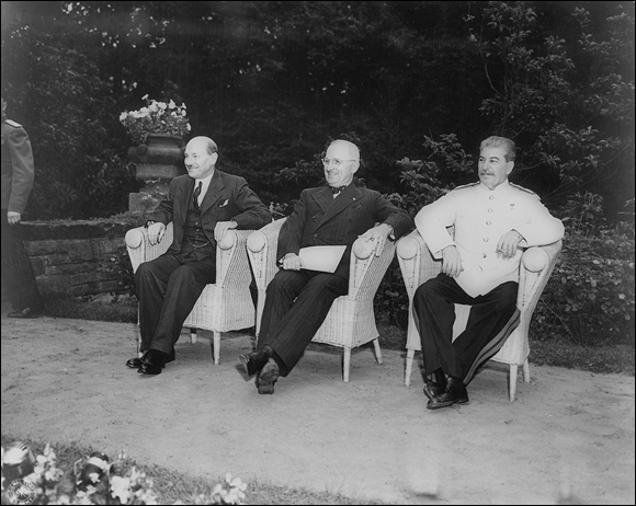 Photo depicts Atlee, Truman, and Stalin at the Potsdam Conference.