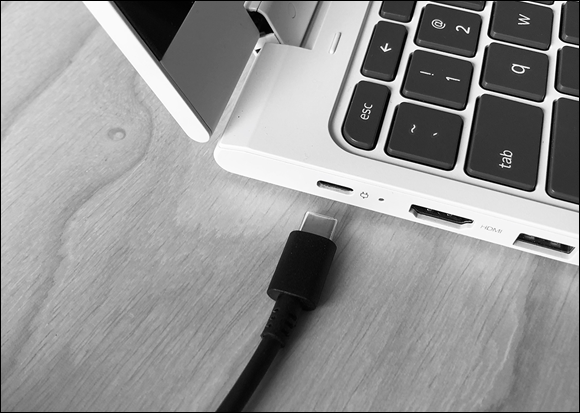 Photo depicts a USB-C style power adaptor.