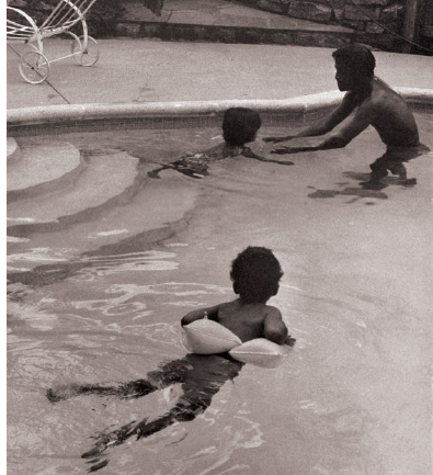 My brother Mark and I taking a swim with our father, 1966.