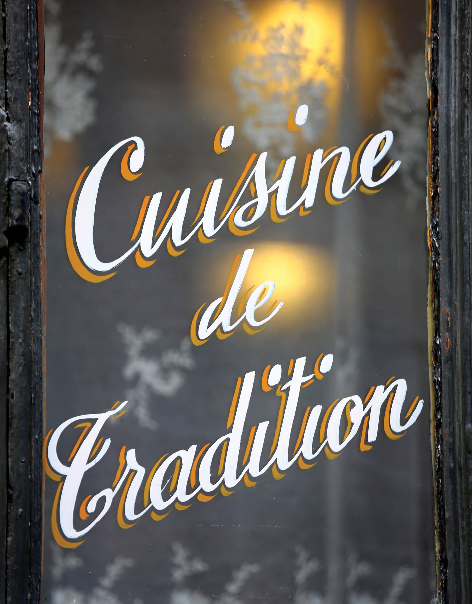 Photo of a "Traditional Cuisine" sign.