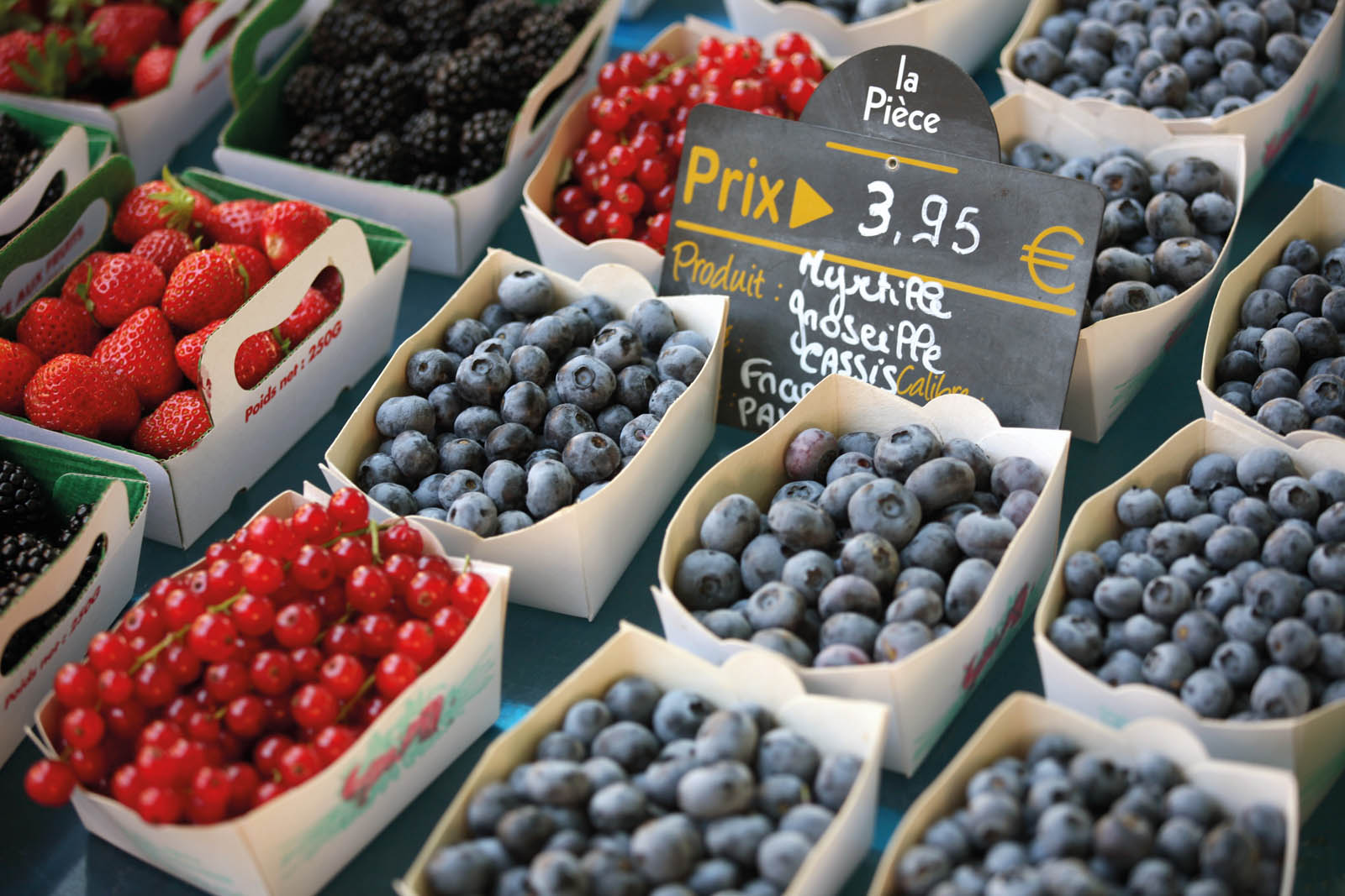 Photo of fresh berries at a market.