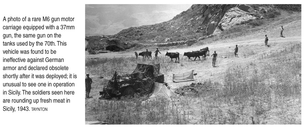 A photo of a rare M6 gun motor carriage equipped with a 37mm gun, the same gun on the tanks used by the 70th. This vehicle was found to be ineffective against German armor and declared obsolete shortly after it was deployed; it is unusual to see one in operation in Sicily. The soldiers seen here are rounding up fresh meat in Sicily, 1943. TAYNTON