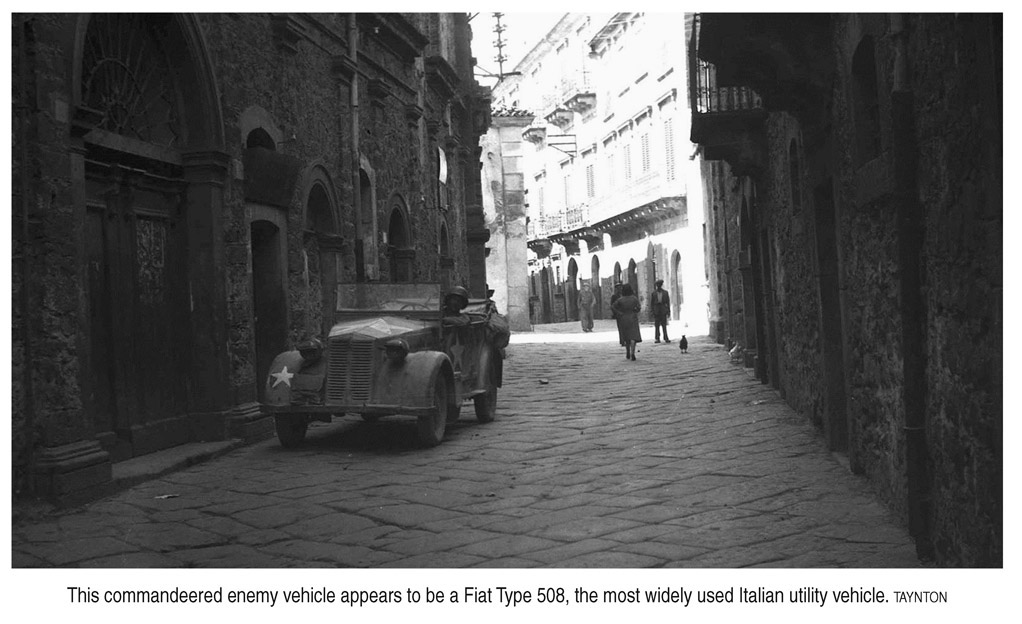 This commandeered enemy vehicle appears to be a Fiat Type 508, the most widely used Italian utility vehicle. TAYNTON