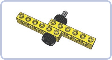 A 5-stud-long axle used to keep two bricks (yellow) together between two gears (black). The axle can rotate inside the bricks, and the gears’ rotation can be used to transfer drive.