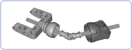 An open ball joint with a universal joint visible inside. A universal joint becomes more effective inside a ball joint because it’s protected from structural stress; as a result, less friction is generated in it.