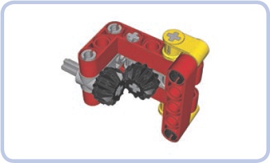 Perpendicular gears reinforced with L-shaped beams. Note that one end of the beams is held together by a vertical beam. This is because there are only axles on this end of the beams and the axles don’t hold the beams together. The other end of the beams has a connector with pins that hold the beams together with a force very unlikely to be overcome by gears.