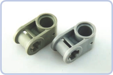 A connector: old (left) and new (right). Even though the old piece is free from damage or visible wear, the difference is obvious.