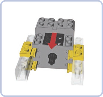 The slots on the sides of the 43362 motor fit plates with rails. The motor can be firmly secured using two of these (or more). As shown by the red arrow, the motor must be slid onto these plates with rails.