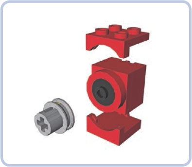 An exploded view of the Micromotor, showing its upper and lower brackets, pulley, and motor