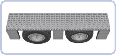 The Technic Racing wheel with a regular tire (left) and a balloon tire (right), viewed from the side and under a mudguard. The regular tire appears bigger because of its larger side surface, even though its diameter is actually slightly smaller than that of the balloon tire.