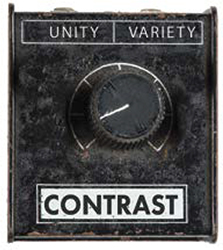 A black plate with the text "CONTRAST" is present at the bottom. The text "UNITY" is present at top left and the text "VARIETY" is present at top right. A knob is present at the center with its pointer pointing to the lower left.