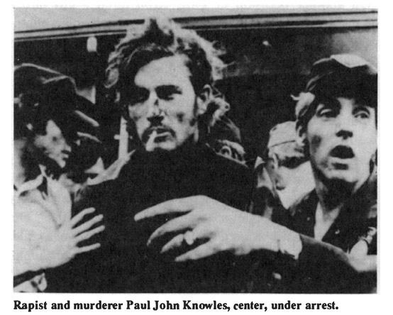 Rapist and murderer Paul John Knowles, center, under arrest.