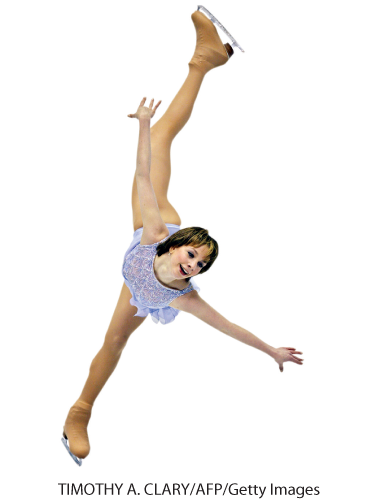 A photo shows Sarah Hughes figure skating wearing a lilac figure skating dress.