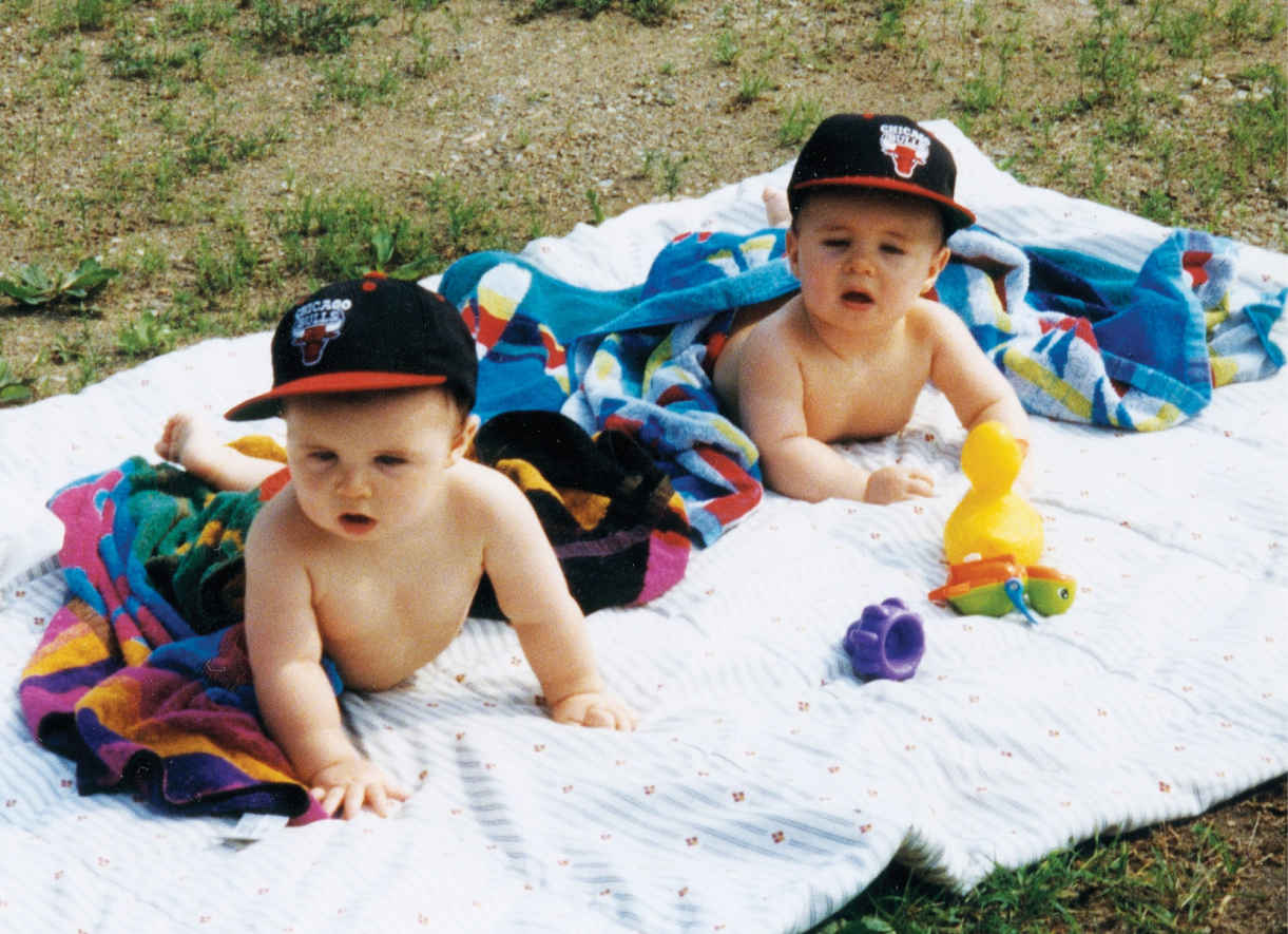 The twins at one year old, with the Chicago Bulls caps Wayne gave them. Wyatt is on the left.