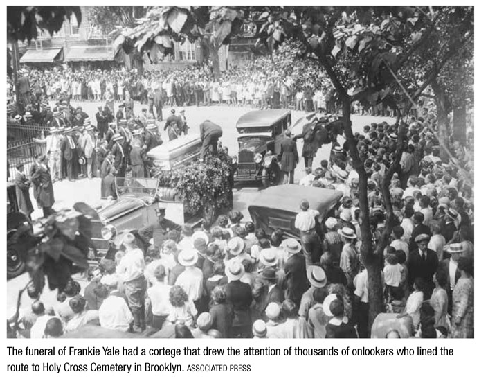 The funeral of Frankie Yale had a cortege that drew the attention of thousands of onlookers who lined the route to Holy Cross Cemetery in Brooklyn. ASSOCIATED PRESS