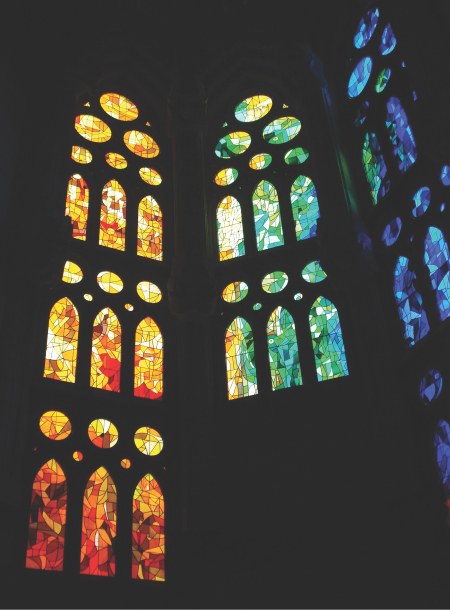 Photograph showing stained glass, Sagrada Familia, Gaudi, Barcelona.