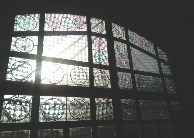 Photograph of a glass window at Parc Guell, Gaudi, Barcelona.