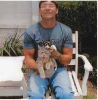 Frank with kittens at Louisiana State Prison, 2017. (Author Collection)