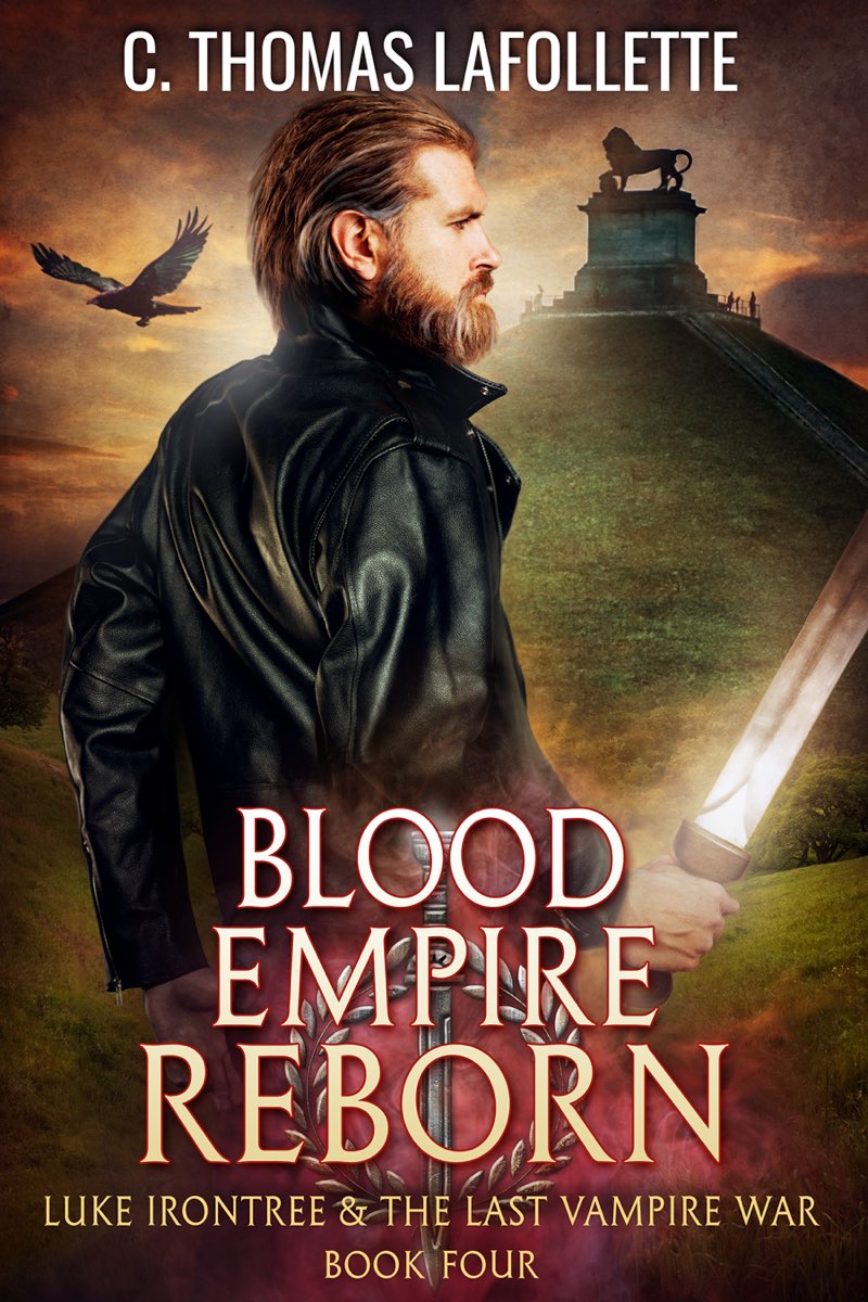 A bearded man with brown hair stands in front of the Butte du Lion at Waterloo. He wears a leather jacket and holds a gladius sword. The book title is Blood Empire Reborn by C. Thomas Lafollette. Book 4 of the Luke Irontree & The Last Vampire War.