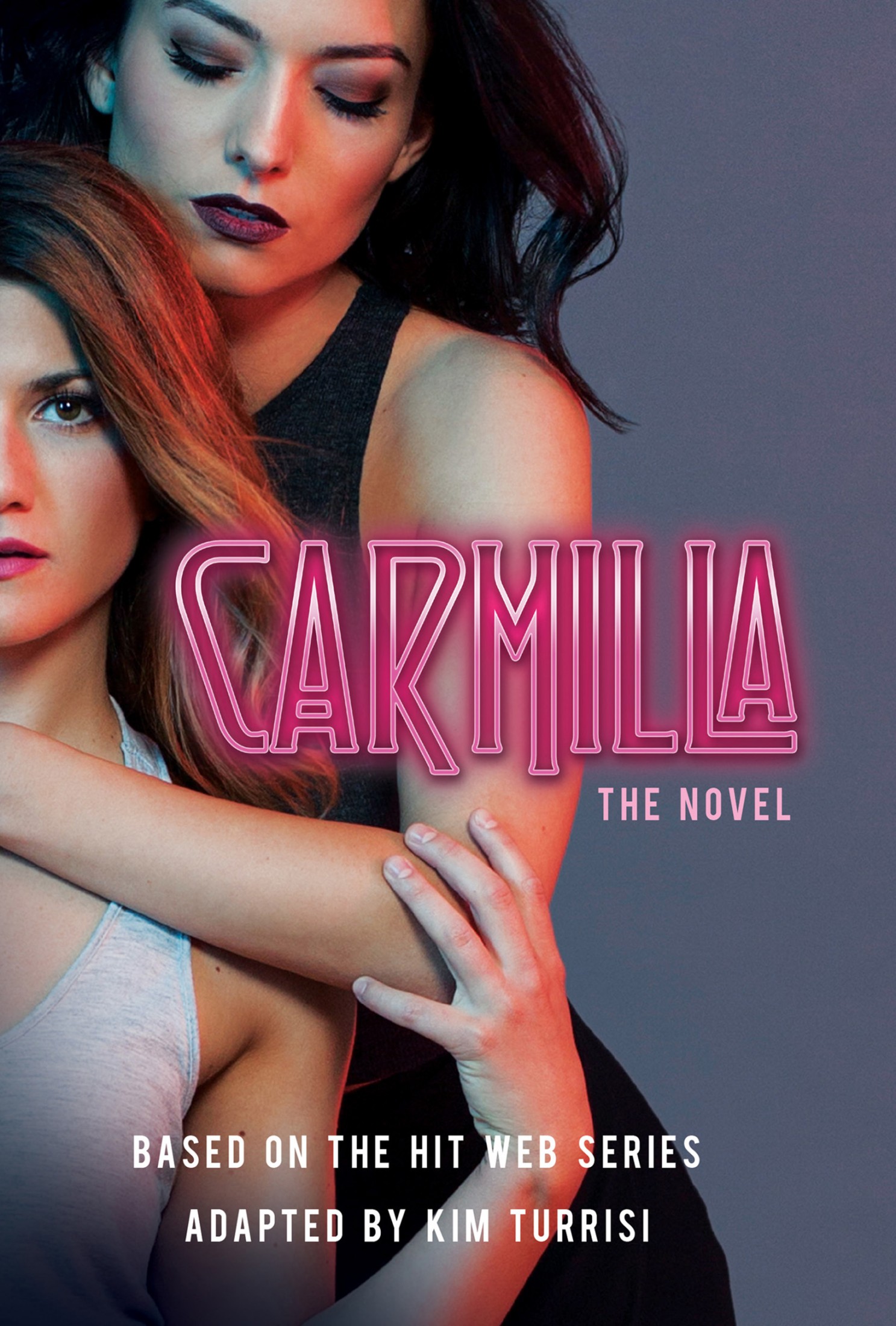 Cover image: Carmilla. The Novel. Based on the hit web series. adapted by Kim Turrisi. Image of two women in a loving embrace.