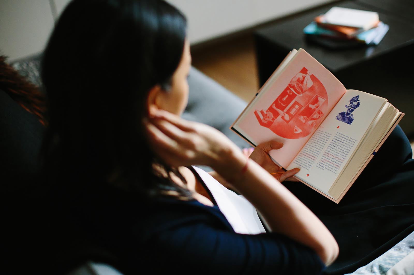 Photo of a woman reading.