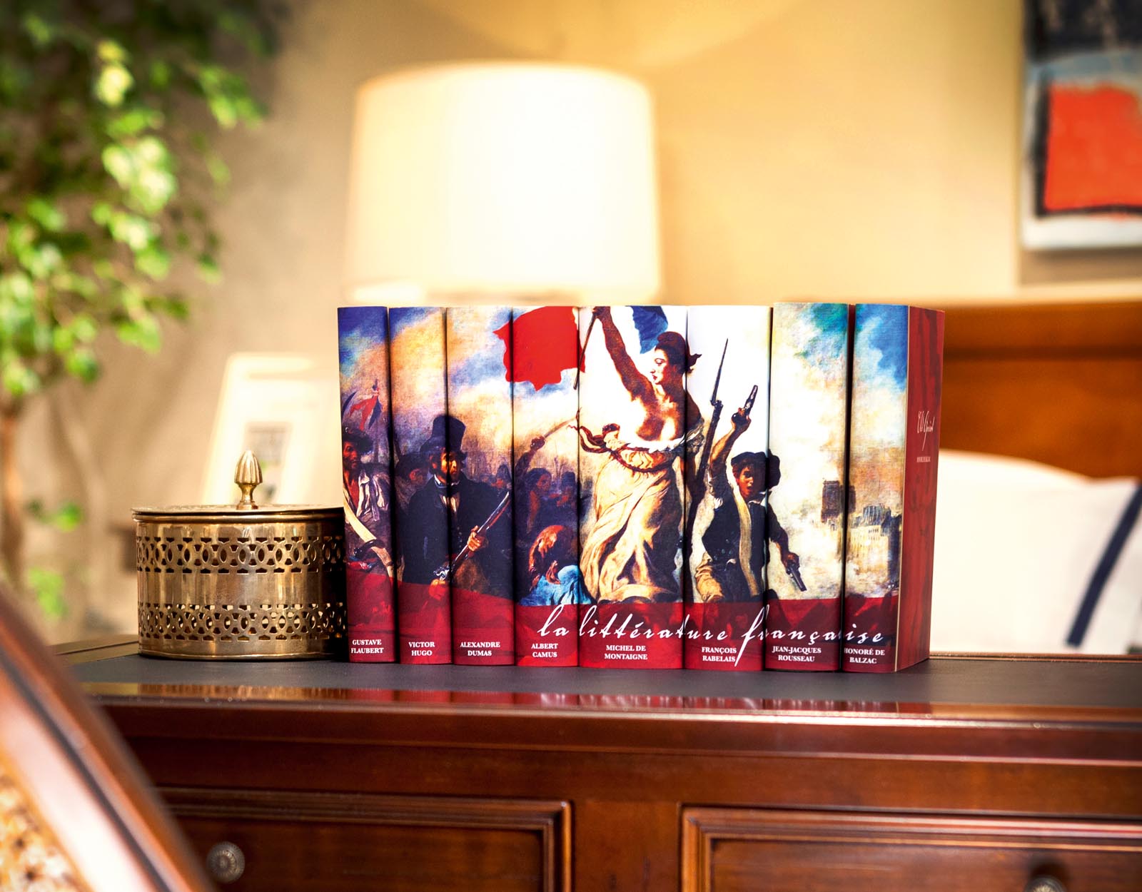 Photo of books with custom jackets forming an image of a battle.