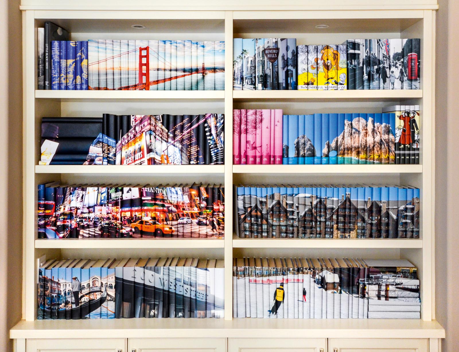 Photo of a closer view of some of the groups of books jacketed with travel destinations.