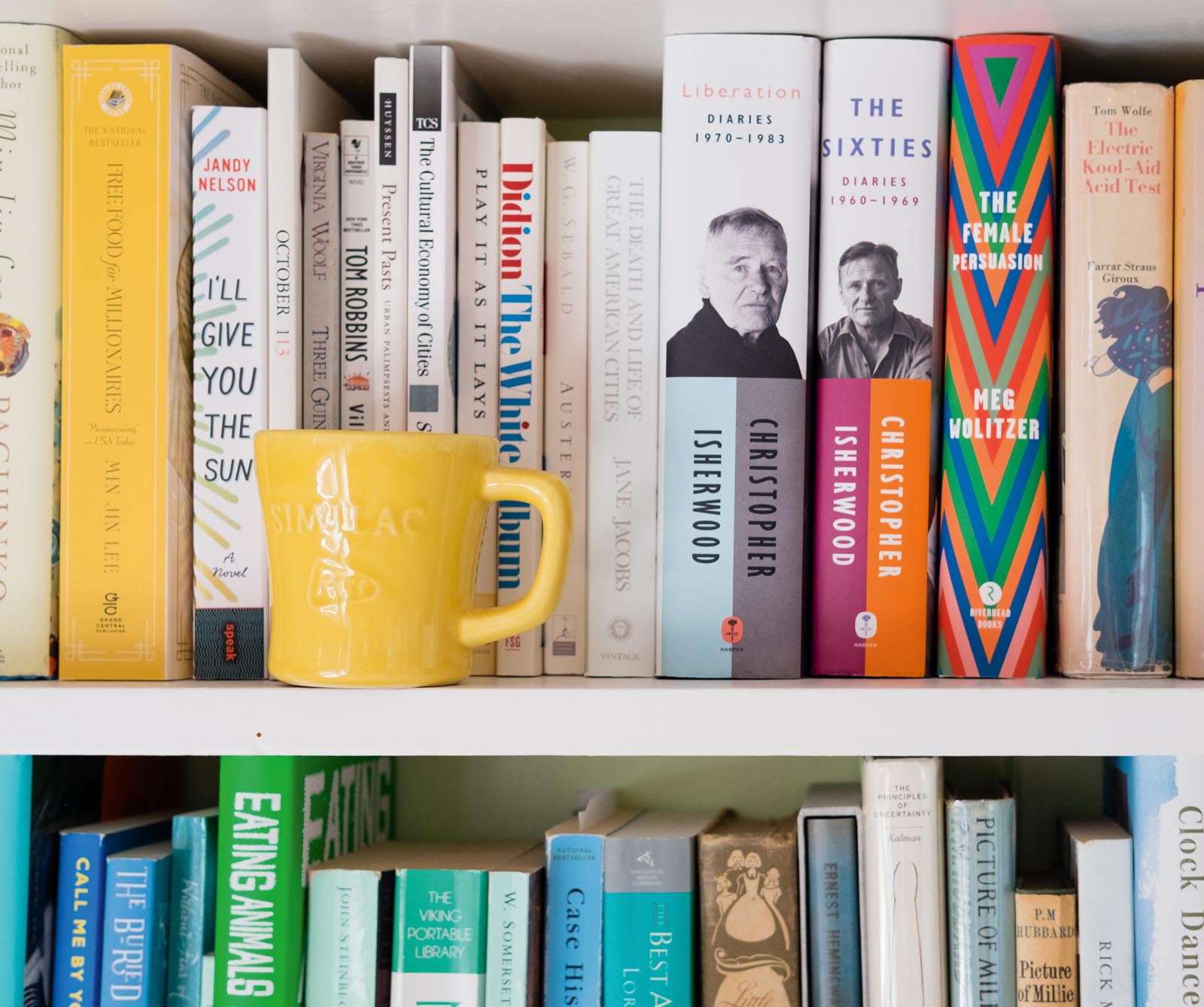 Photo of shelves of worn books.