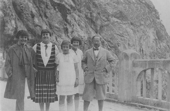 Start of image description, 1. Hilda and George Clarke, my mum and dad, in front of the half-timbered asbestos shed in next door’s back yard., end of image description