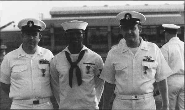 (Left to right) Chief Engineman (SW) George A. Cowan, Electrician’s Mate