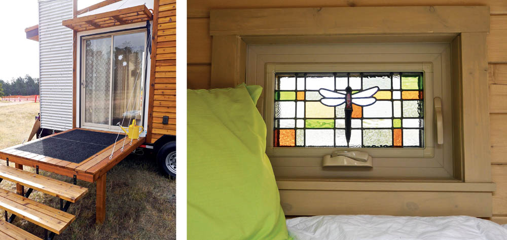 The fold-down front deck and a stained glass window in the Dragonfly Tiny House.