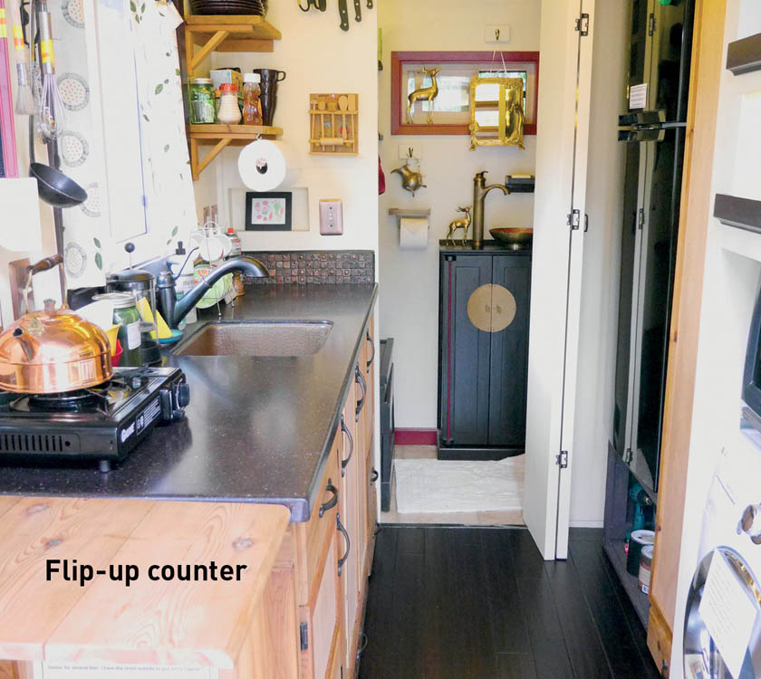 The kitchen area of the Maiden Mansion, with a flip-up counter.