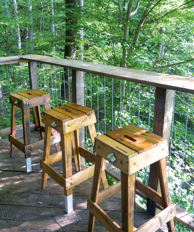 Bar stools on the back deck of the Luna Loft treehouse.