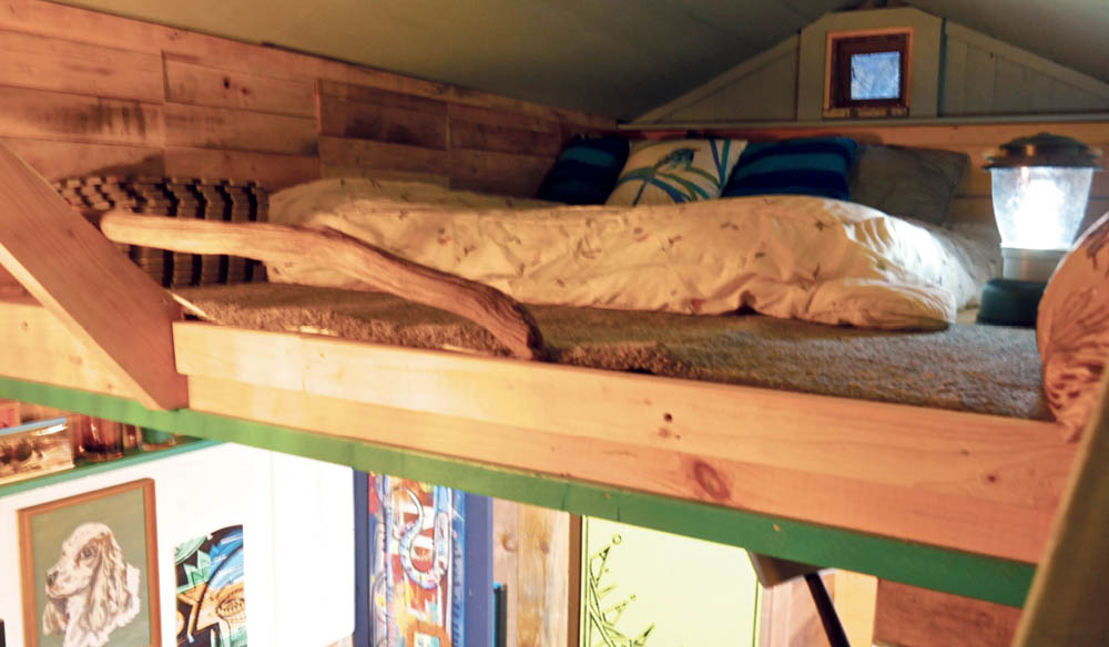 The sleeping loft in the Pallet House tiny house.