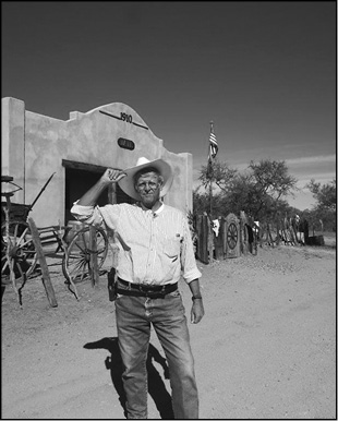 Dan is standing outside of the Gleeson jail building.