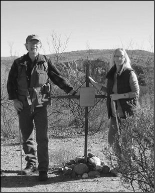 Dwight and Rhonda by a marker at the Presidio.