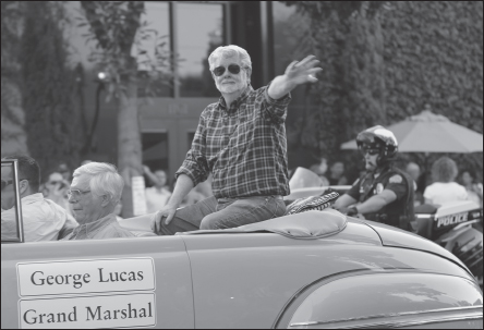 In 2013, George Lucas made his one and only public homecoming to Modesto for the fortieth anniversary of American Graffiti, down the streets he used to cruise—and here, past his father’s old stationery and toy store.