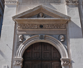 Loggia, begun in 1492, door to the staircase.