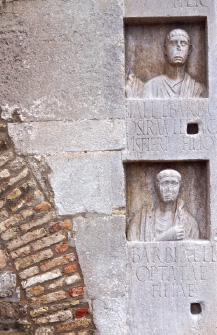 Cathedral, jamb of the west door, incorporating Roman portraits of the Barbia family.