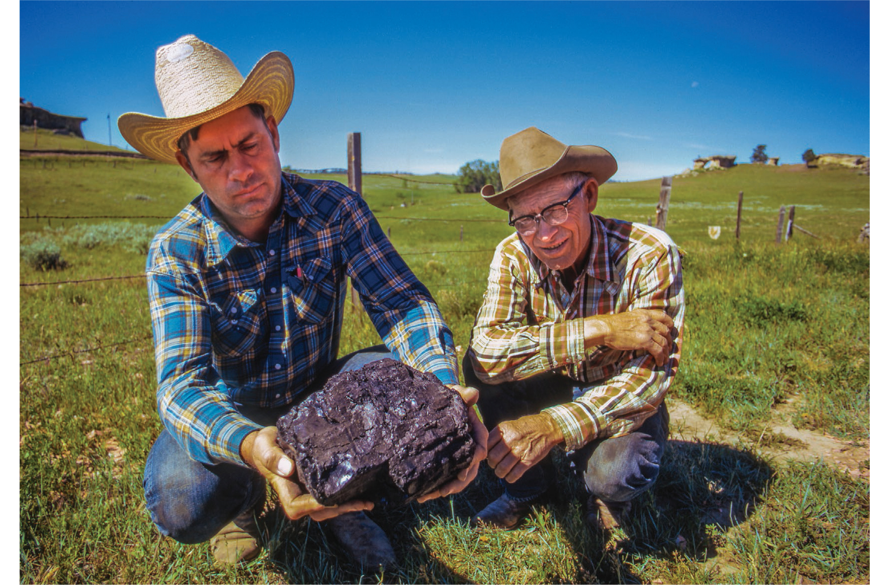 John Redding holds a chunk of...