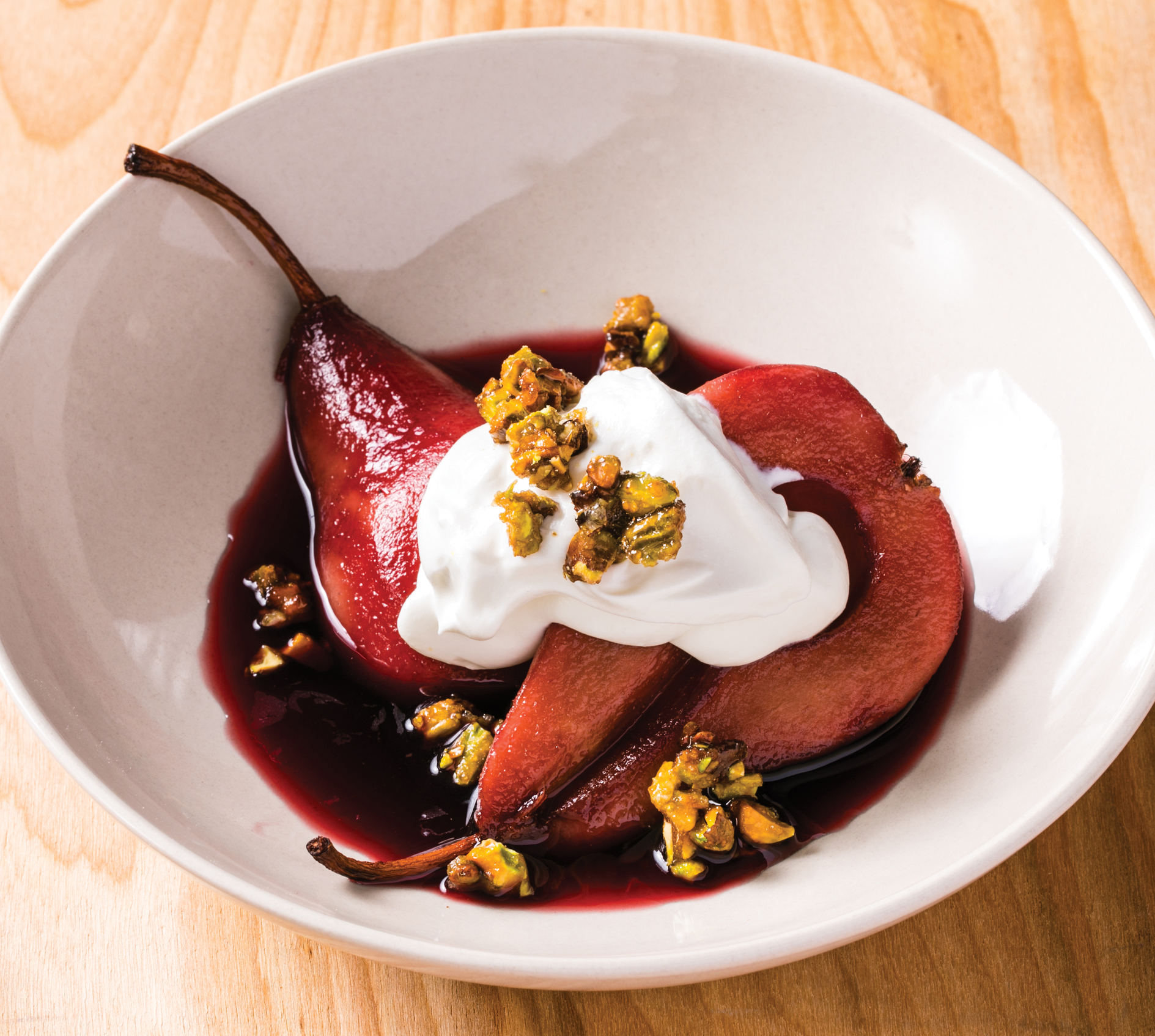 Red Wine–Poached Pears with Whipped Sour Cream and Candied Pistachios