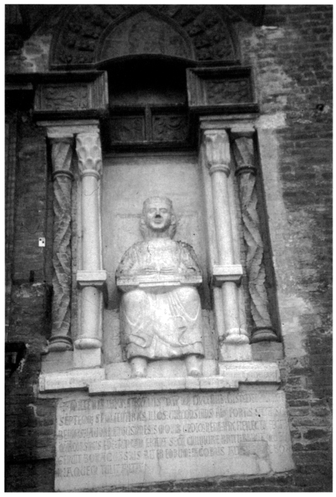 Virgil in cathedra. Thirteenth-century statue, Palazzo del Poaestà, Mantua. Photograph courtesy of Christopher Kleinhenz.