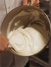 Freshly spun ice cream in a mixing bowl