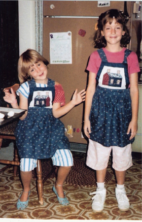 Christina Tosi as a child in the kitchen with her sister