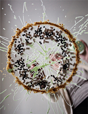 Outline of Grasshopper Pie, including crumb crust, chocolate chips, marshmallows, and mint glaze, taken from under glass